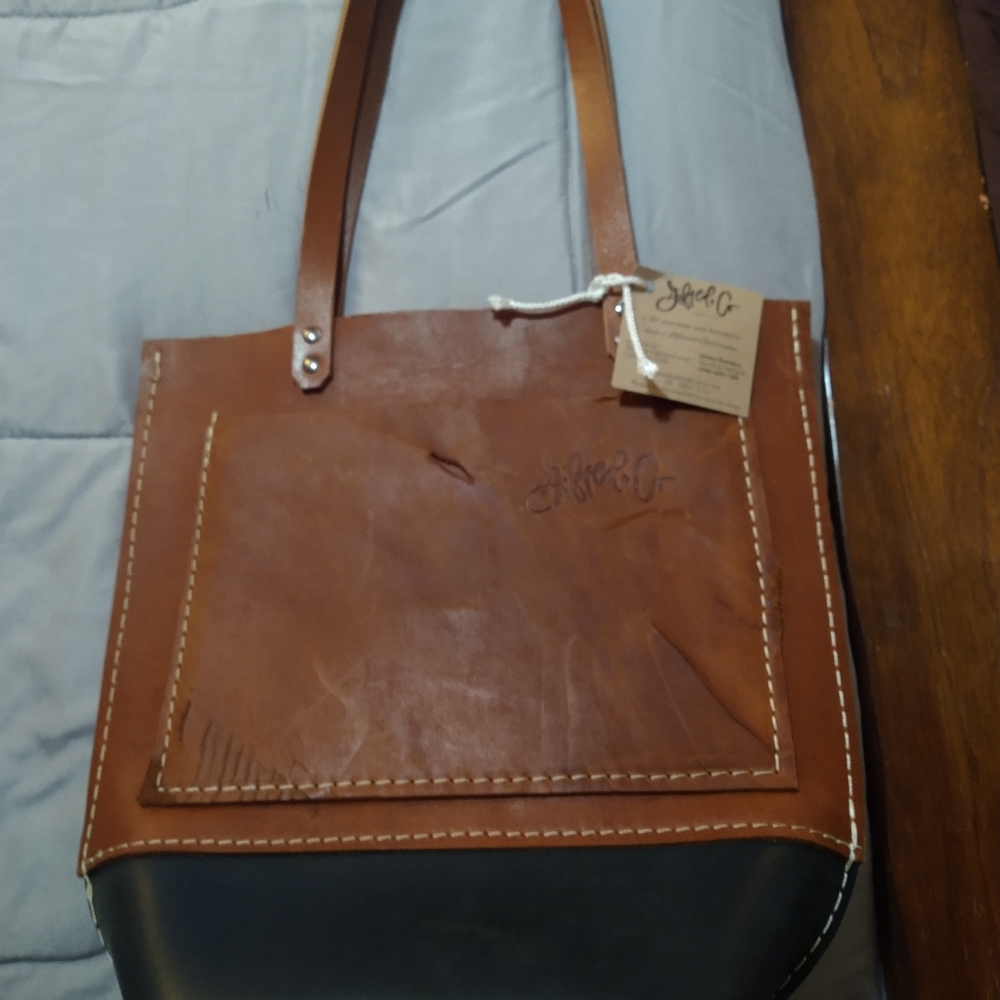 Handmade 100% genuine leather hand bag by gifted and company